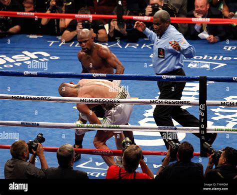 Floyd Mayweather stops Conor McGregor in 10th round in Las Vegas.